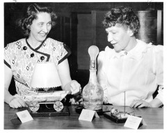 North Hollywood, CA - North Hollywood Junior High School craft exhibit - Ruth Niece (right) and Margaret Berry (left) examine school display