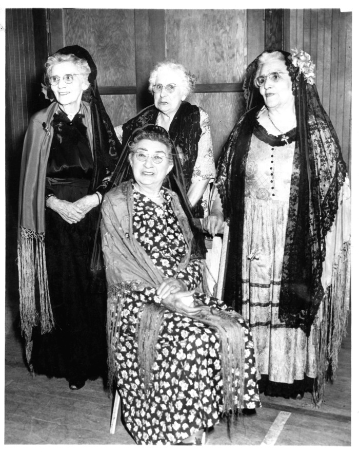 San Fernando, CA - Lopez, Geronimo descendants - mantilla banquet - San Fernando fiesta - Mrs. Ramona Shaug (left), Mrs. Mary Hendricks (center), Mrs. Catalina Lopez Millen (right) - Mrs. Victoria Candelot (seated)