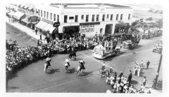 San Fernando, CA - San Fernando Fiesta - Photo showing the parade passing the Porter Hotel and the Mission Building