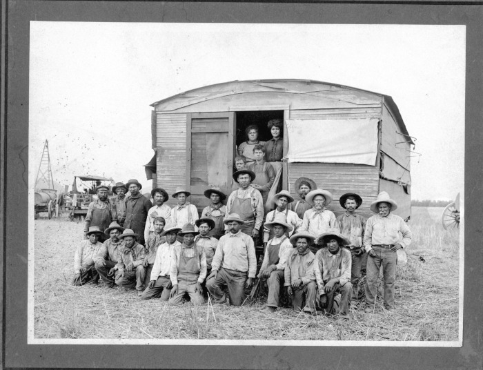 San Fernando Valley, CA - Migrant farm workers in front of living quarters - People not identified