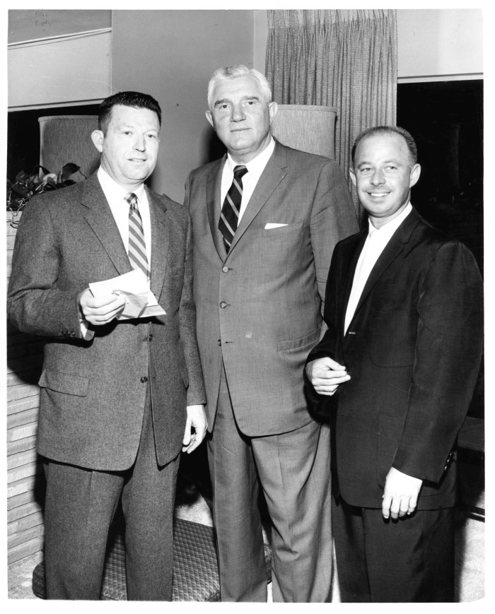 San Fernando Valley Trojan Club - Meeting held to lay plans for a scholarship fund raising party - Left to right are Dr. Eugene C. Chapman, newly elected club president