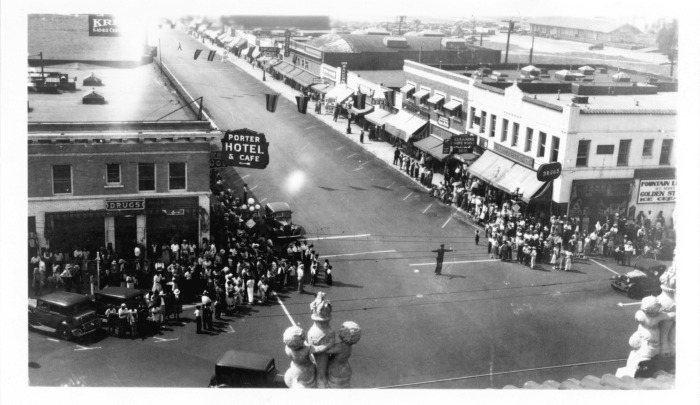 San Fernando, CA - San Fernando Fiesta - Photo showing the parade passing the Porter Hotel and the Mission Building