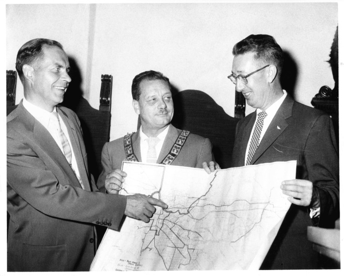 Northridge, CA - San Fernando Valley State College (CSUN) - Dr. J. Burton Vasche, State Superintendent of Public Instruction shows location of new college. With him are Delmar Oviatt (left), Dean of College and Cecil Burnhouse, Exalted Ruler of San Fernando Elks