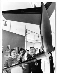 Northridge, CA - Valley State College (CSUN) - Art exhibit at Fine Art Gallery. Examining the airplane model are students Annette Hall and George Sullivan with instructor Donald Chipperfield