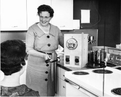 Northridge, CA - Valley State College (CSUN) - Dr. Stevenson shows metering machine that measures electric cooking power