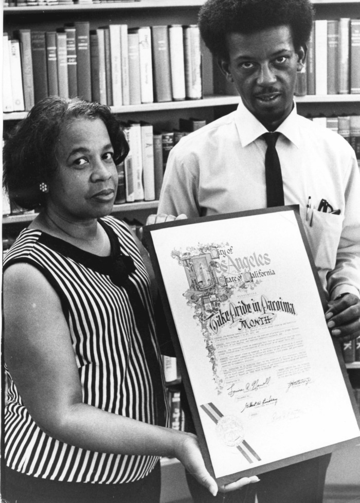 Aurilda Jones (Head Librarian) and Bill Steward (Chairman, Citizens Commission for Community Support, Area #5)