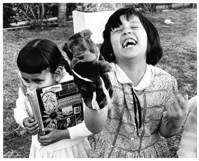 Canoga Park, CA - Our Lady of Guadalupe - Lorraine Valenzuela and her friend read an encyclopedia