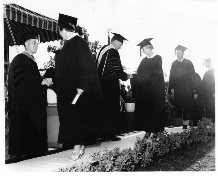 Northridge, CA - Valley State College (CSUN) - Commencement at Valley State College - Anne Baille, second from left, receives diploma - Others are not identified