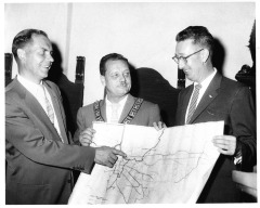 Northridge, CA - San Fernando Valley State College (CSUN) - Dr. J. Burton Vasche, State Superintendent of Public Instruction shows location of new college. With him are Delmar Oviatt (left), Dean of College and Cecil Burnhouse, Exalted Ruler of San Fernando Elks