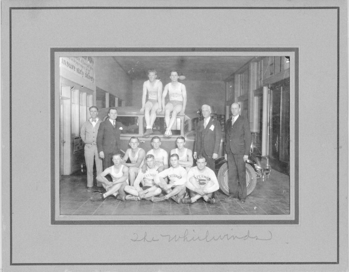 Whirlwinds, Chapman & Morris Chevrolet, Standing (L - R)  1.Unidentified, 2. Bill Morris,  3. Mr. Chapman, 4. Unidentified. Sitting on car 1. Unidentified, 2. J. Everett Henderson. Others unknown.
